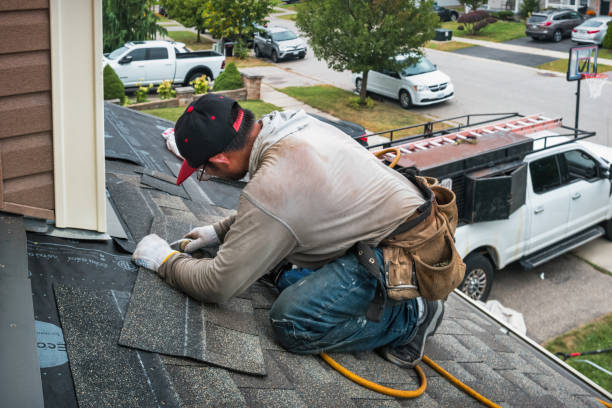 Professional Roofing technician working in Burlington, NC
